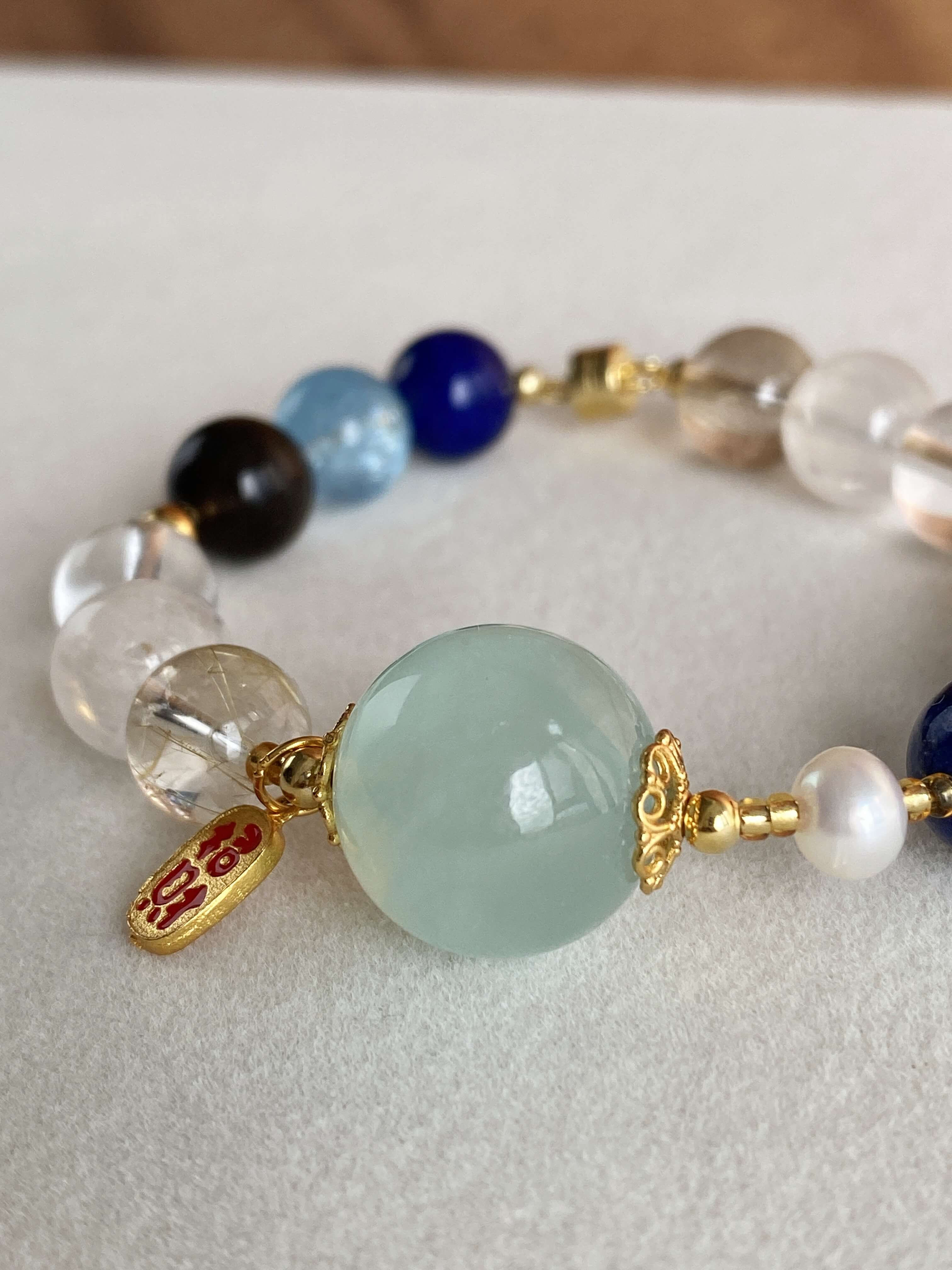 Wisdom Crystal Bracelet Details of the Aquamarine Center Bead and 925 Sterling Silver Components